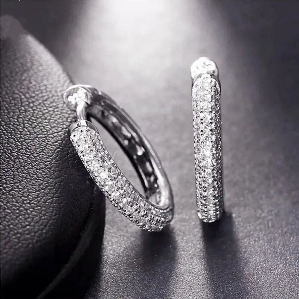 The Brilliance Mini Hoop Earrings in 925 and cubic zirconia